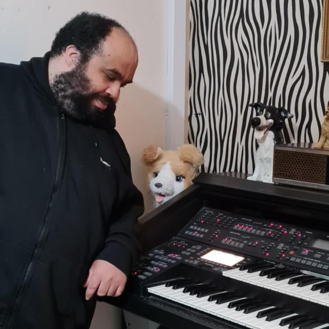 A man looking at his organ